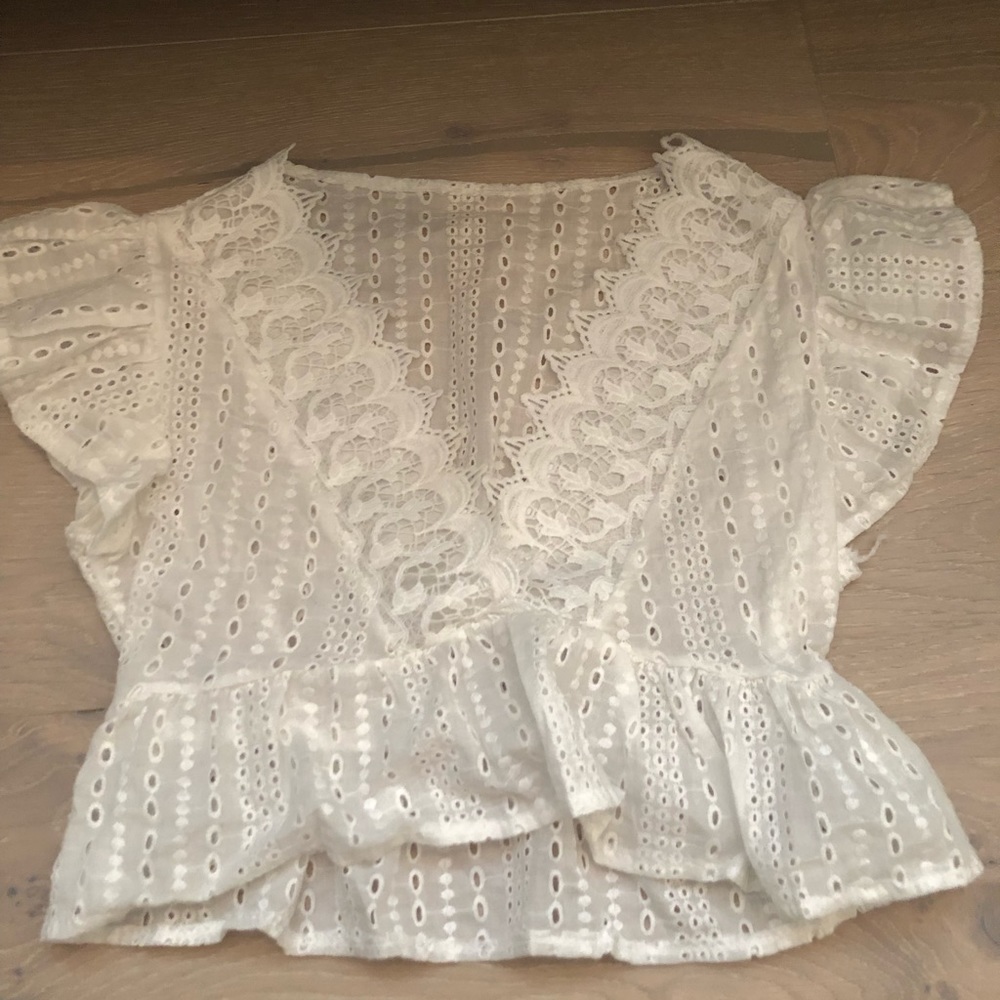 White ruffle detail blouse